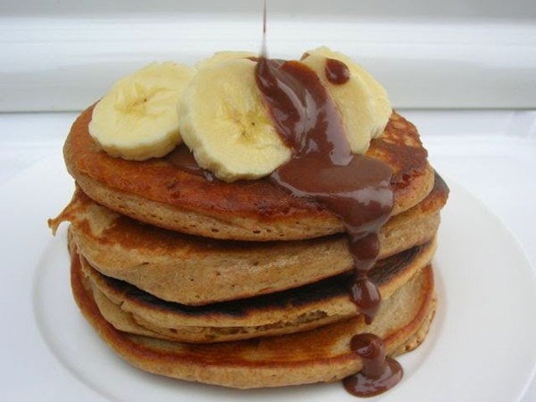 Spiced kefir pancakes with manuka honey and crème fraîche chocolate sauce