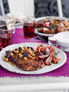 Spiced lamb and chickpeas with sumac, parsley and tomato salad