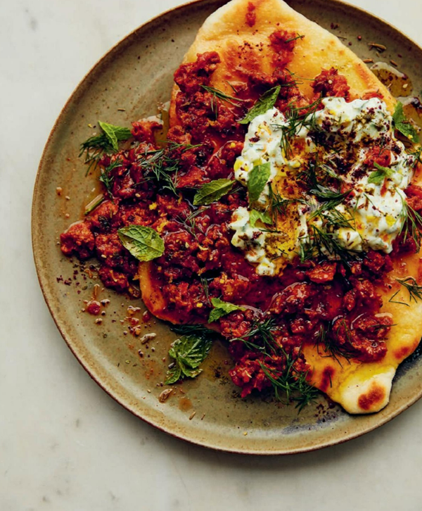 Spiced lamb and tomato flatbreads with mint and cucumber yoghurt