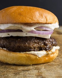 Spiced lamb burgers with feta and tahini sauce