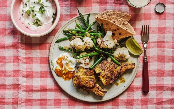 Spiced lamb chops with green beans, peas and cauliflower
