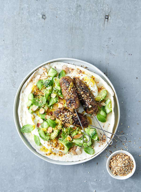 Spiced lamb kofta with smashed cucumber almonds and yoghurt