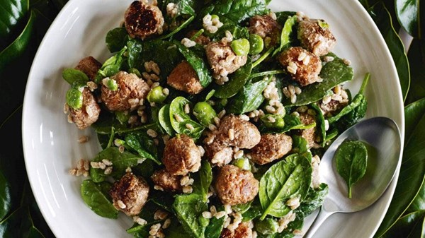 Spiced lamb meatballs with farro, broad bean and baby spinach salad
