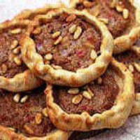 Spiced lamb, tomato and pine nut pastries (Lahem b'ageen)