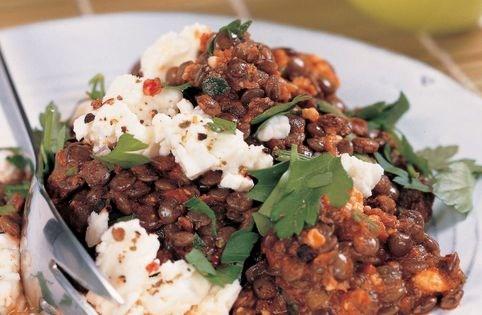 Spiced lentils with cheese and tomato