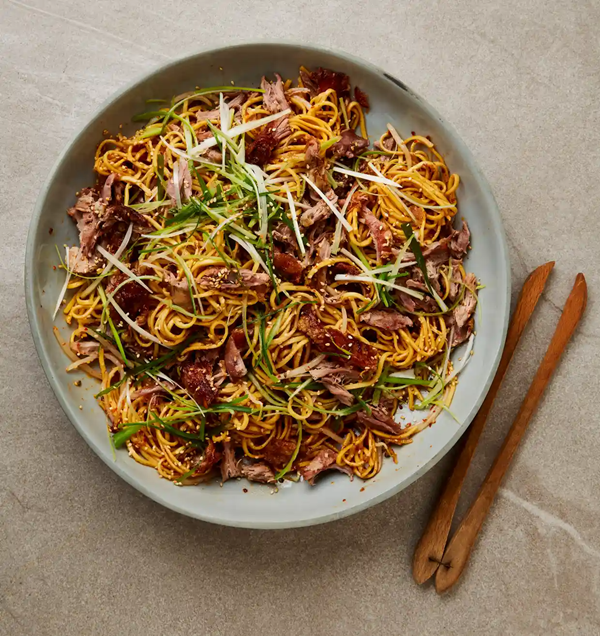 Spiced longevity noodles with crispy duck