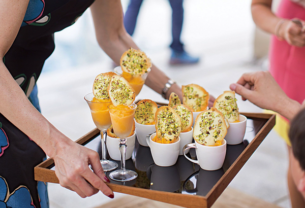 Spiced mango sorbet with pistachio tuiles