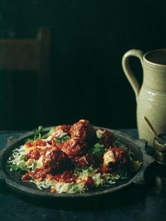 Spiced meatballs in tomato sauce