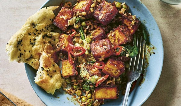 Spiced paneer, spinach and pea grain bowl with mint yoghurt sauce