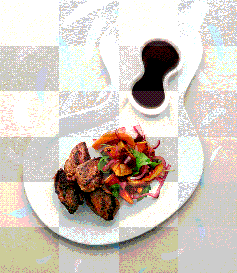 Spiced pigeon breast with roast butternut salad