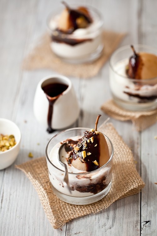 Spiced poached pears with warm chocolate sauce & vanilla ice cream
