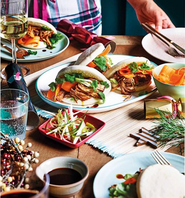 Spiced pork bao buns with homemade pickles