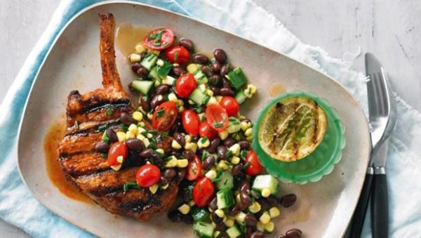 Spiced pork, corn and black bean salad with charred lime