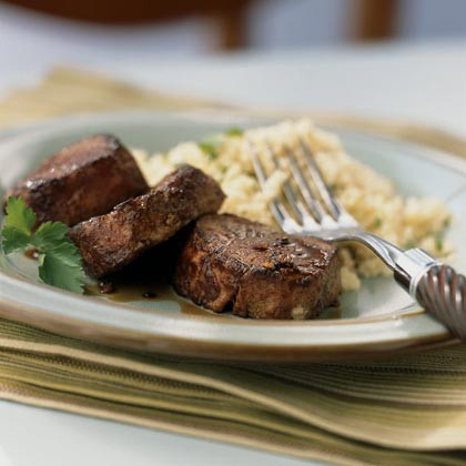 Spiced pork with bourbon reduction sauce