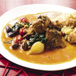 Spiced pork with silverbeet and tomatoes