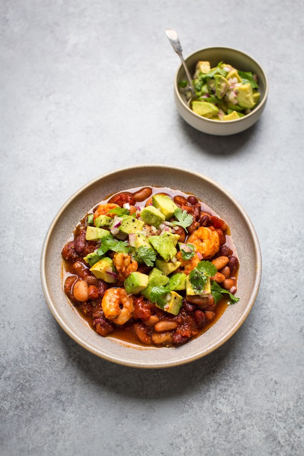 Spiced prawns with Mexican bean stew & avocado salsa