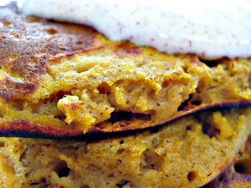 Spiced pumpkin pancakes topped with cinnamon maple Greek yogurt and a hint of ginger salt
