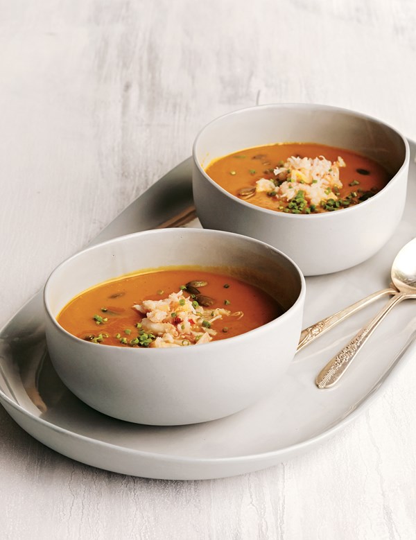 Spiced pumpkin soup with crabmeat and pumpkin seeds