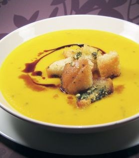 Spiced pumpkin soup with croutons and pumpkin seed oil
