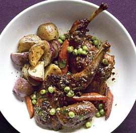 Spiced rabbit tagine with peas and carrots