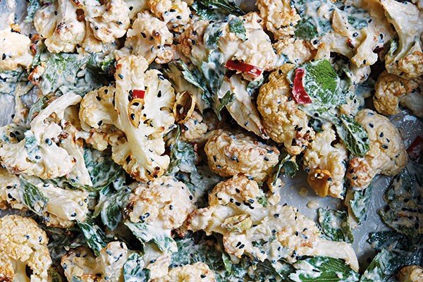 Spiced roast cauliflower and garlic with tahini yogurt dressing
