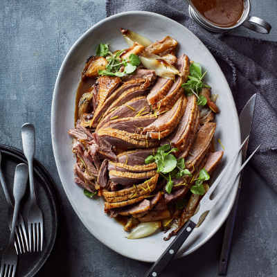 Spiced roast goose with apples and shallots