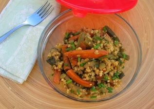 Spiced roasted summer vegetables with millet, peas and lentils
