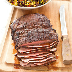 Spiced-rubbed flank steak with toasted corn and black bean salsa