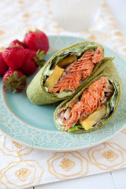 Spiced salmon wraps with pineapple and avocado sauce 