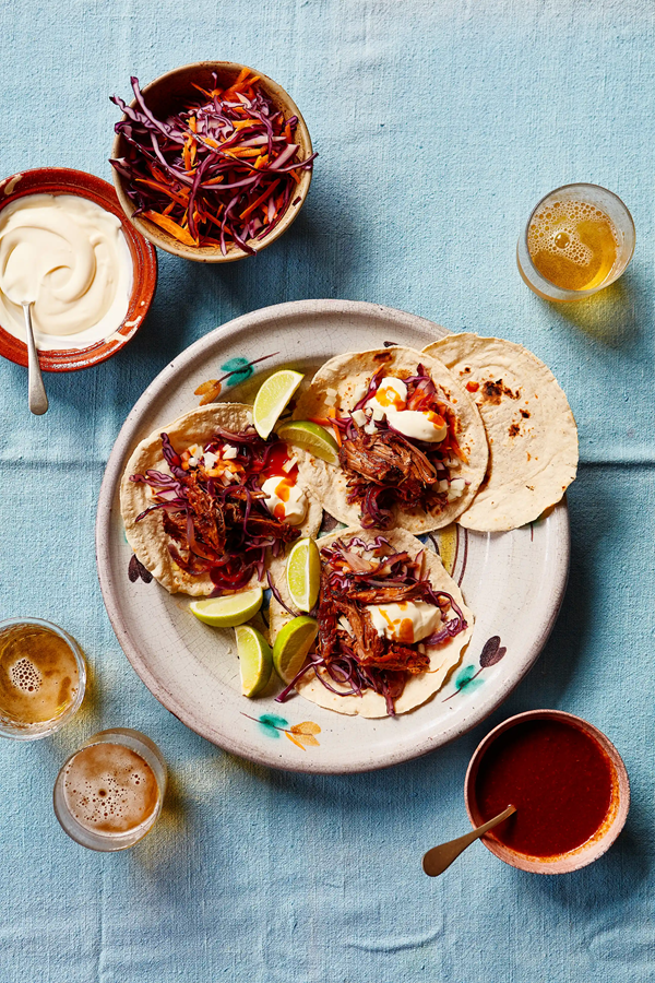 Spiced slow-cooked lamb birria with tacos