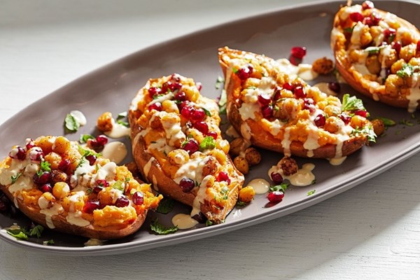 Spiced tahini loaded sweet potatoes