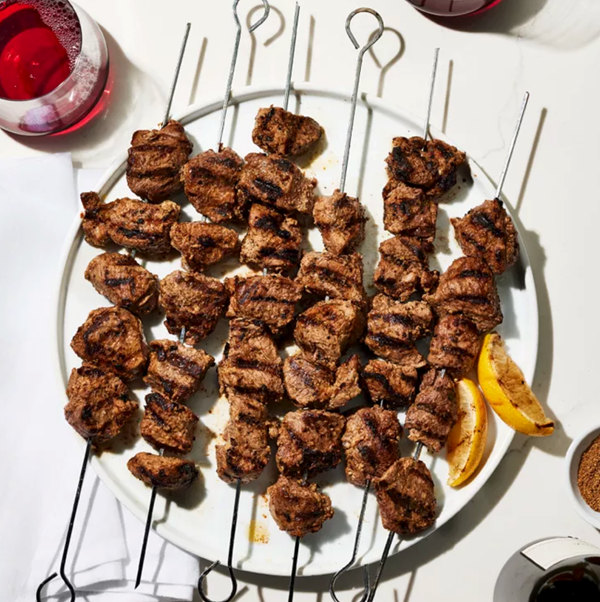 Spiced yogurt-marinated lamb skewers