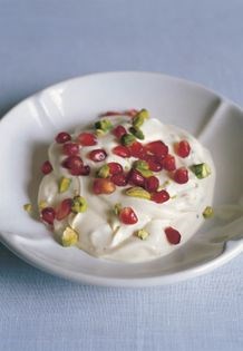 Spiced yogurt with pomegranates and pistachios