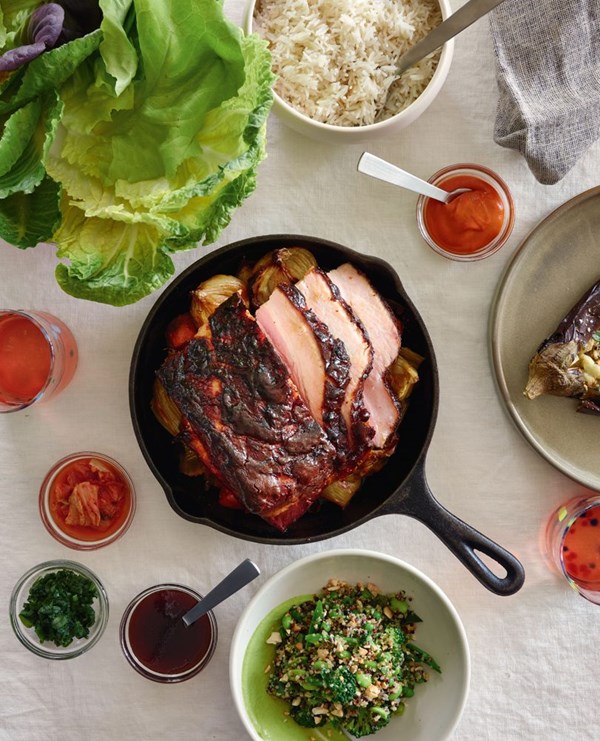 Spicy barbecue pork belly with salted spring onions, ssamjang sauce & kimchi