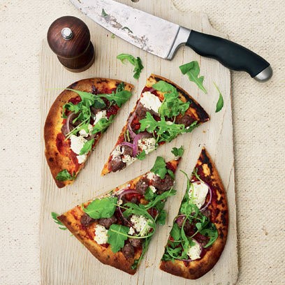 Spicy beef sausage and ricotta naan pizzas