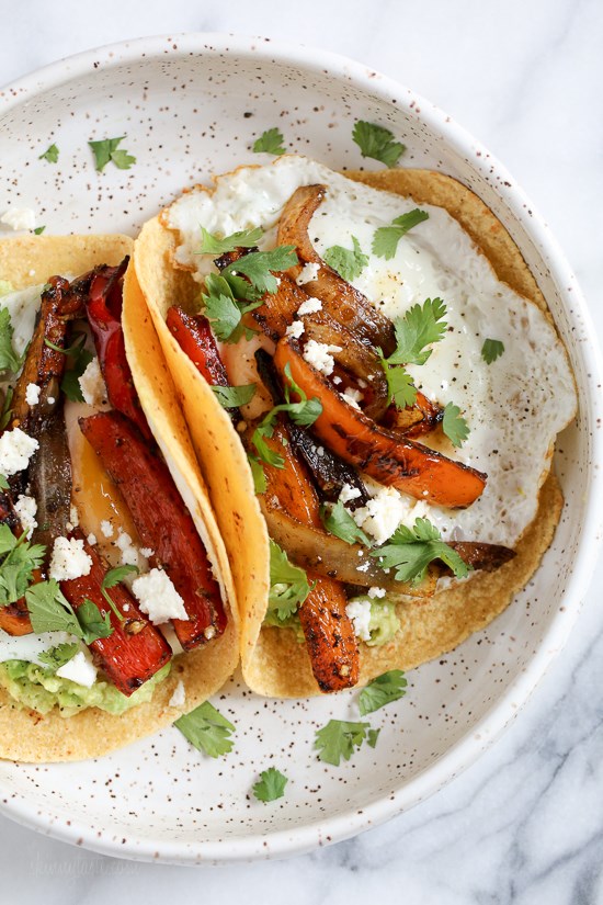 Spicy breakfast fajitas with eggs and guacamole