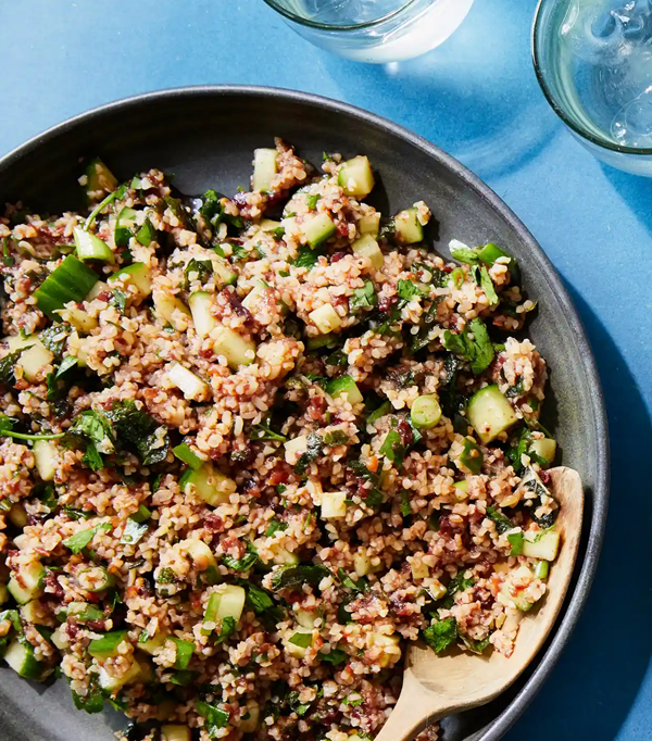 Spicy bulgur salad with tomato and sour cherries