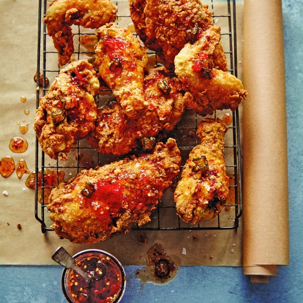 Spicy buttermilk fried chicken with pepper jelly drizzle