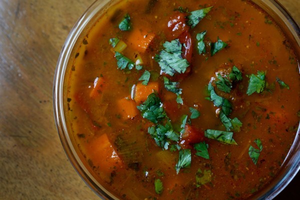 Spicy carrot, tomato, chorizo and cilantro soup