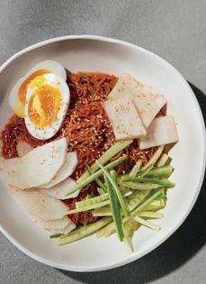 Spicy chewy noodles with chilled beef broth (Bibim naeng myeon)