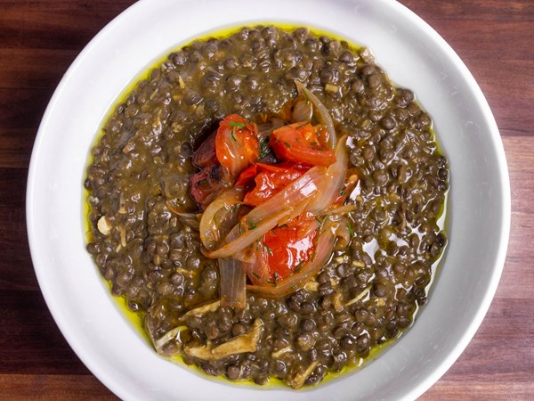 Spicy chicken and lentil stew with jammy onions