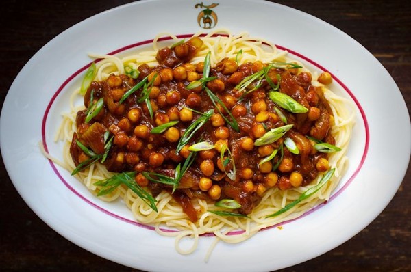 Spicy chickpea and sour tomato curry with pasta