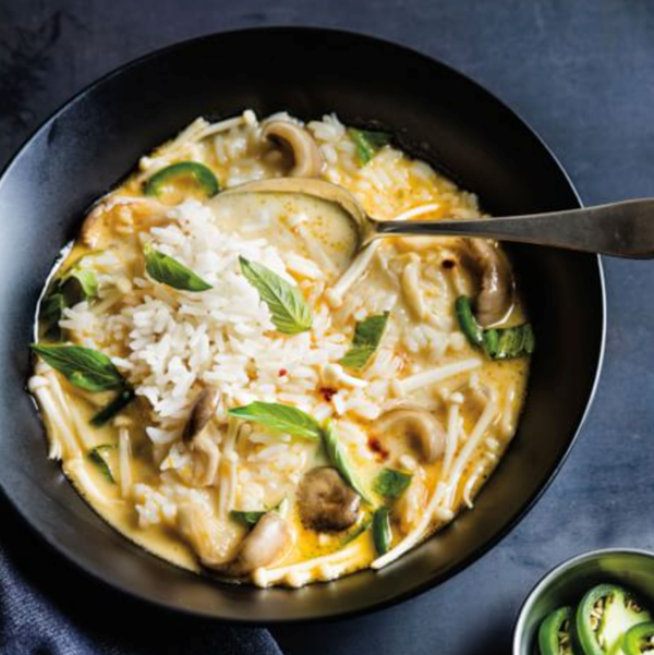 Spicy coconut-mandarin soup with mushrooms