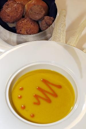Spicy corn soup with roasted red bell pepper and chipotle chile purée