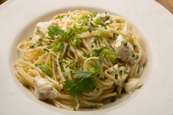Spicy crab linguine with mustard, crème fraîche and herbs