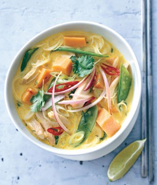 Spicy curry noodle soup with chicken and sweet potato