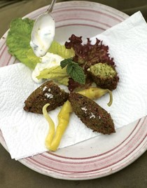 Spicy fava bean fritters with lemon minted yogurt
