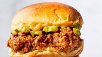 Spicy fried chicken sandwich with spicy-sweet butter and pickles