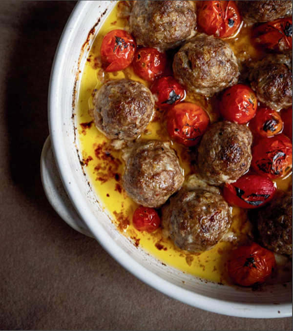 Spicy garlic and oregano meatballs with blistered grape tomatoes