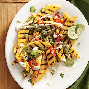 Spicy grilled mango with chiles and crema